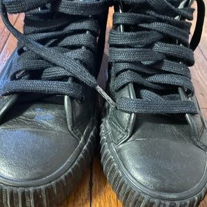 Black leather PF flyers. Men size 7.5/ Women 9